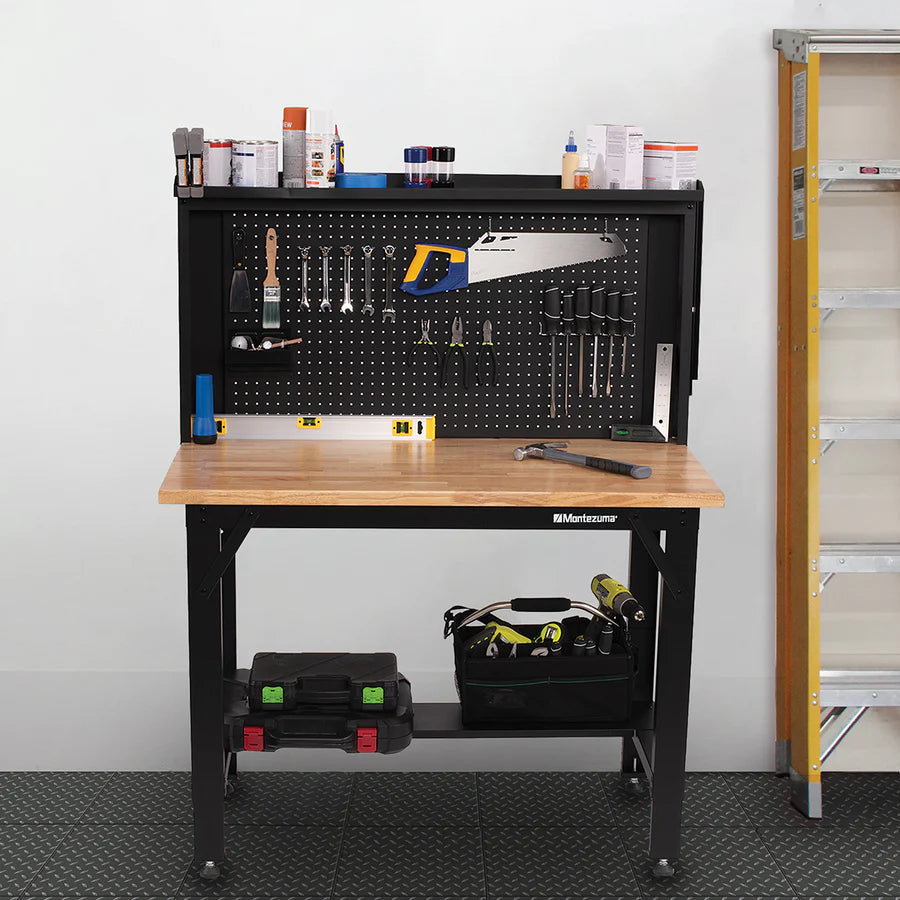 Montezuma 4' Adjustable Height Steel Workbench With Pegboard Back Wall lifestyle picture