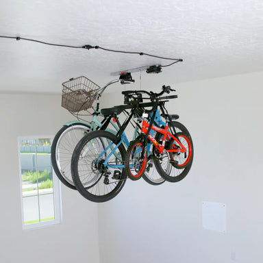 Multibike Lifter - three bikes lifted in garage