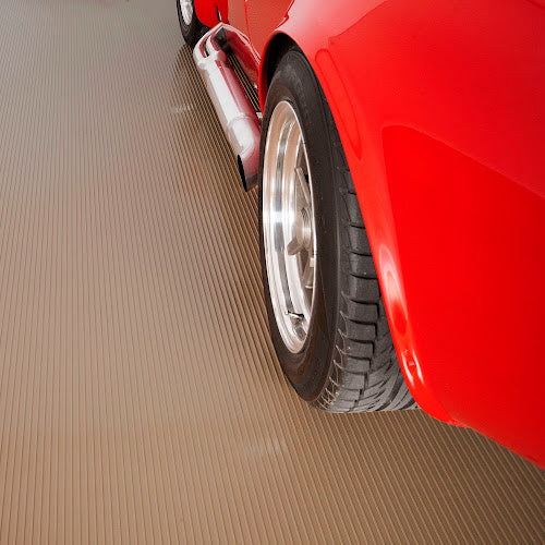 G-Floor® Universal and Garage Ribbed™ Channel Flooring® with car, sandstone